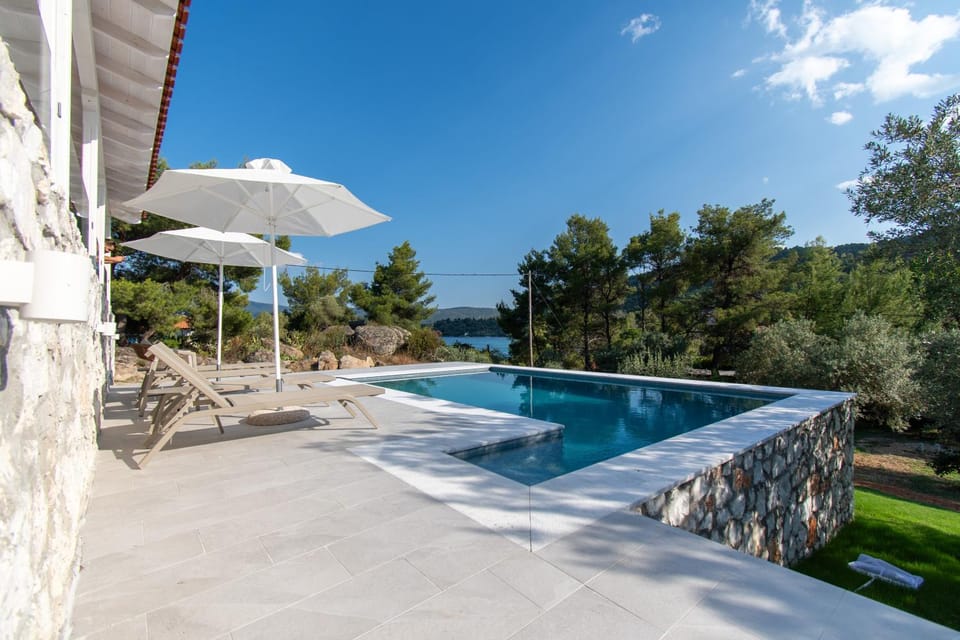 Patio, Day, Natural landscape, Pool view, Sea view, Swimming pool, sunbed