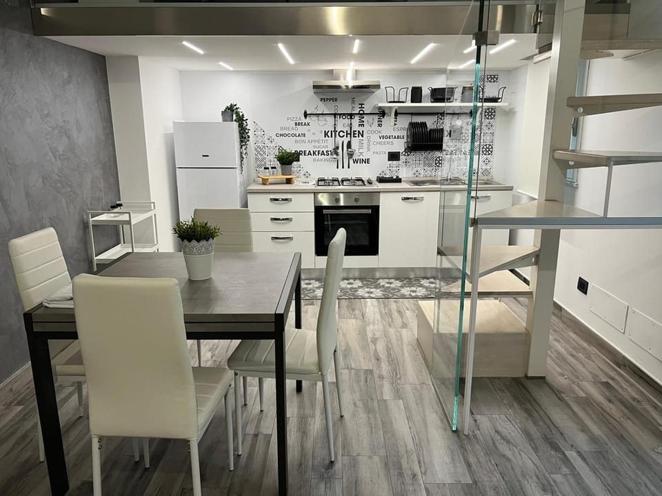 Kitchen or kitchenette, Living room, Dining area, minibar, oven, stove