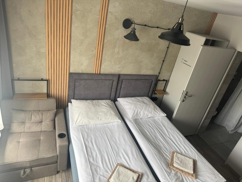 Bed, Living room, Photo of the whole room, Seating area, Bedroom, towels, wardrobe