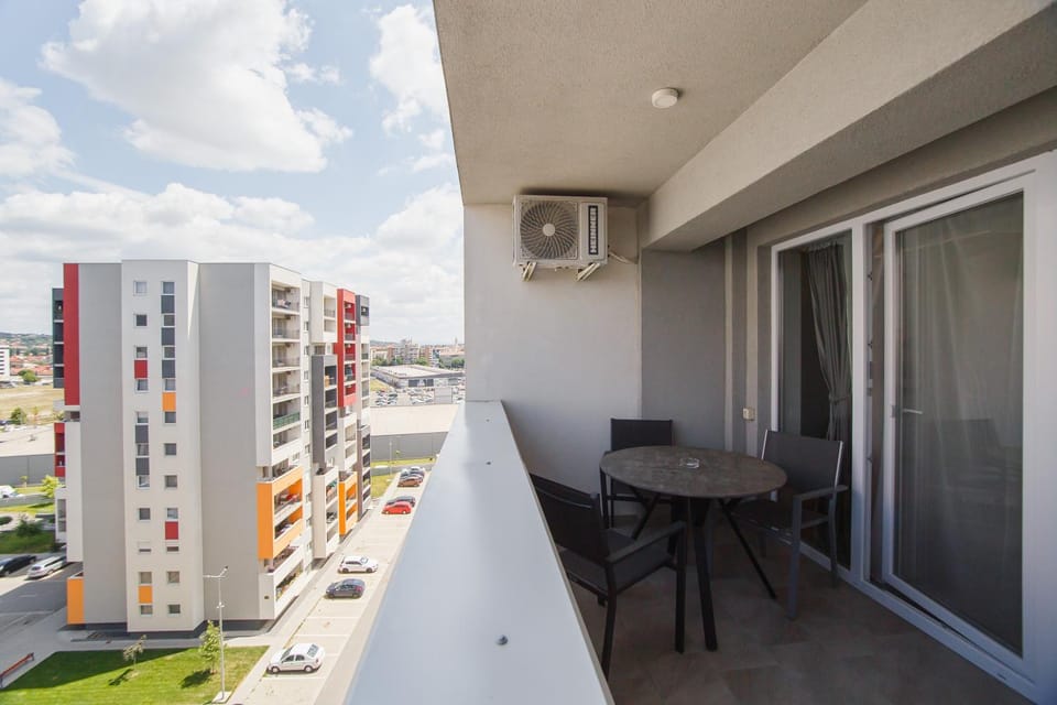Property building, Patio, Day, View (from property/room), Balcony/Terrace, Seating area, air conditioner