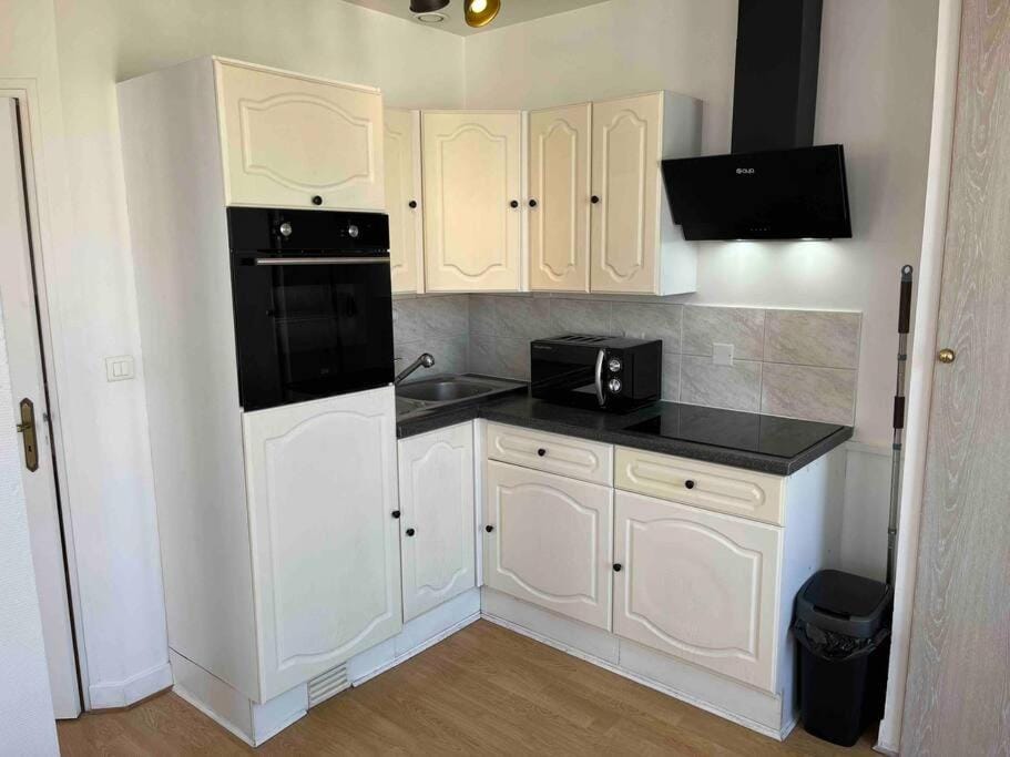 Kitchen or kitchenette, stove