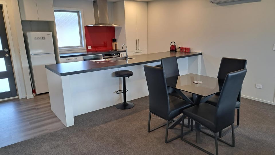 Kitchen or kitchenette, Dining area, dishwasher, microwave, oven, stove, washing machine, dryer
