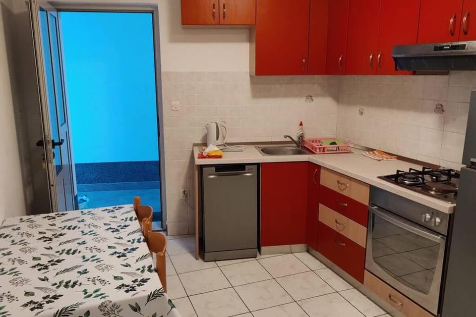 Kitchen or kitchenette, stove
