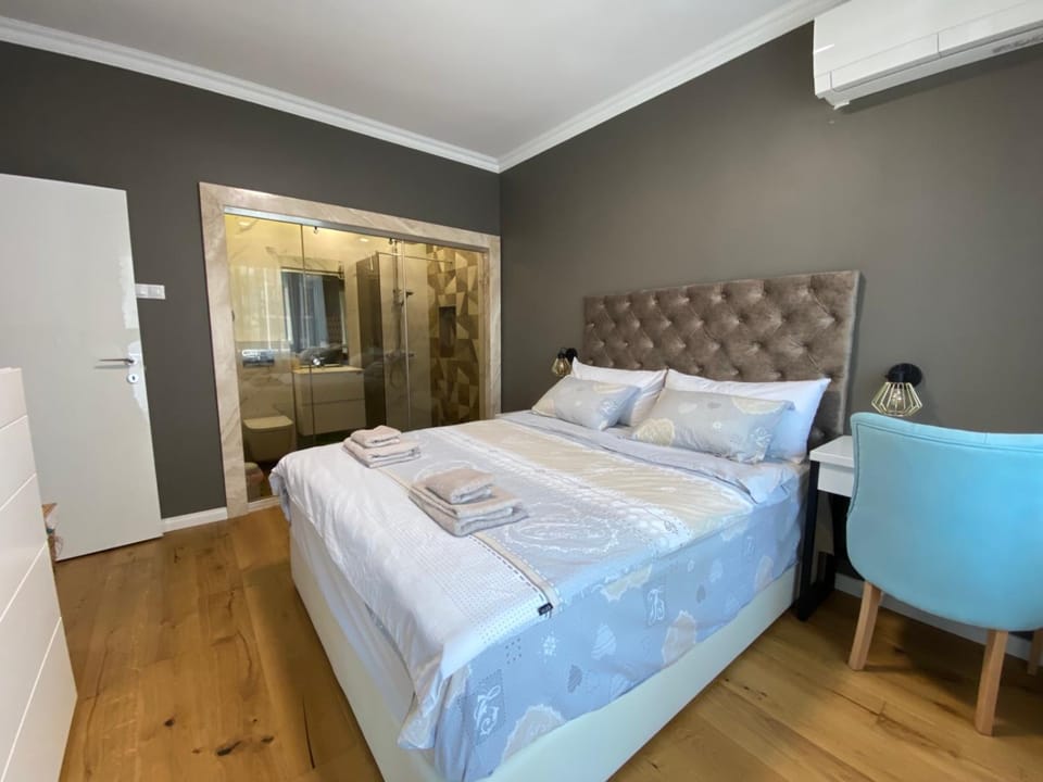 Bed, Photo of the whole room, Bedroom, towels, air conditioner