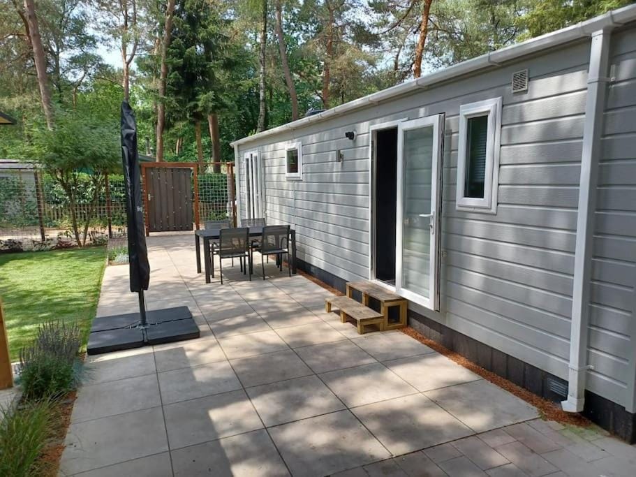 Boshuis met grote tuin I Vakantiepark met Zwembad House in Hoenderloo