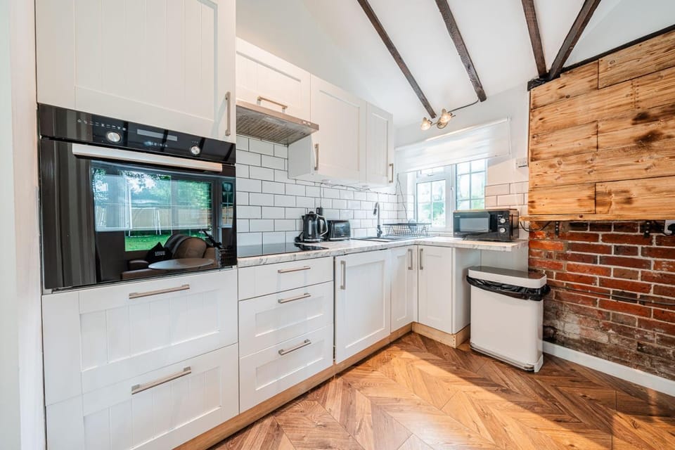 Kitchen or kitchenette, stove, toaster