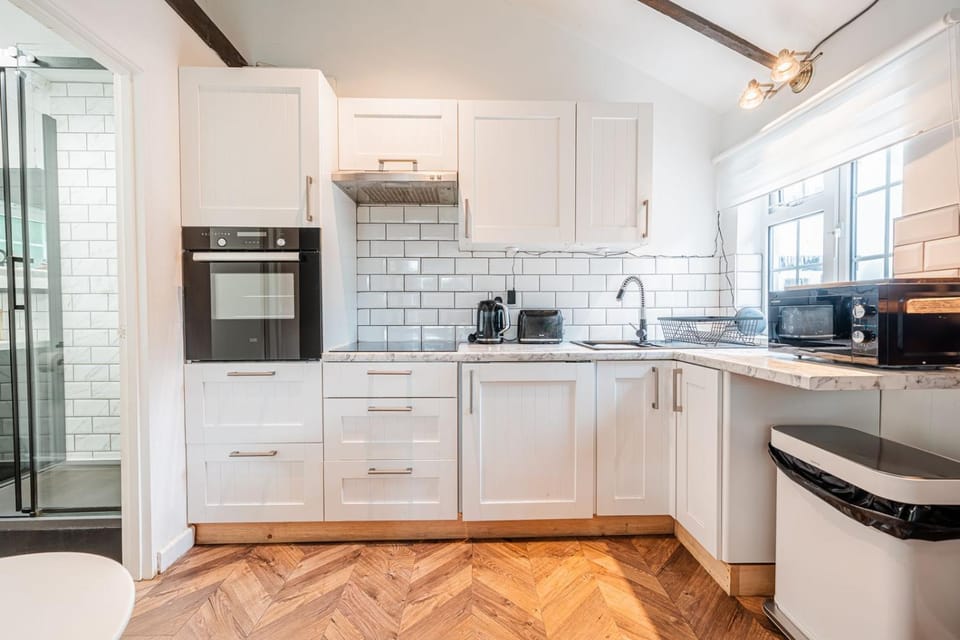 Kitchen or kitchenette, stove, toaster