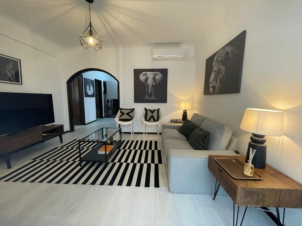 Communal lounge/ TV room, TV and multimedia, Living room, Photo of the whole room, Seating area, air conditioner