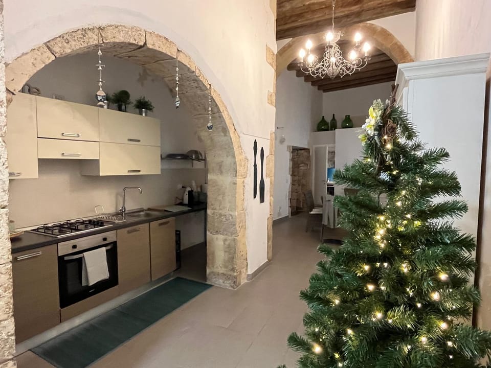 Kitchen or kitchenette, oven, stove, toaster