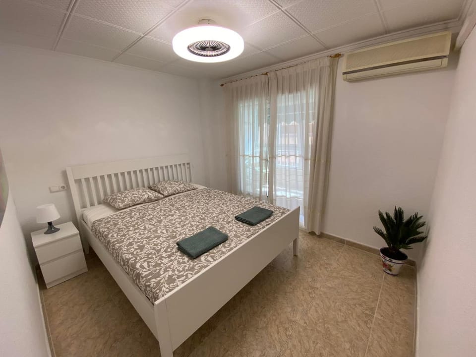Bed, Photo of the whole room, Bedroom, towels, air conditioner