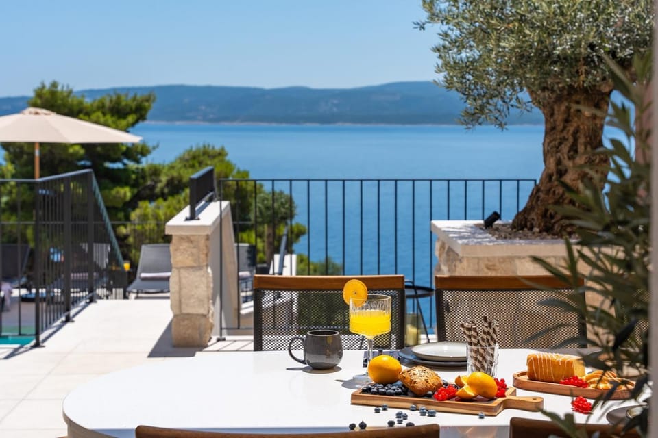Balcony/Terrace, Seating area, Beach, Sea view, Swimming pool