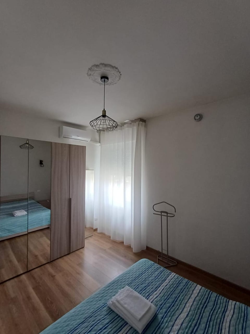 Bed, Photo of the whole room, Bedroom, towels, air conditioner