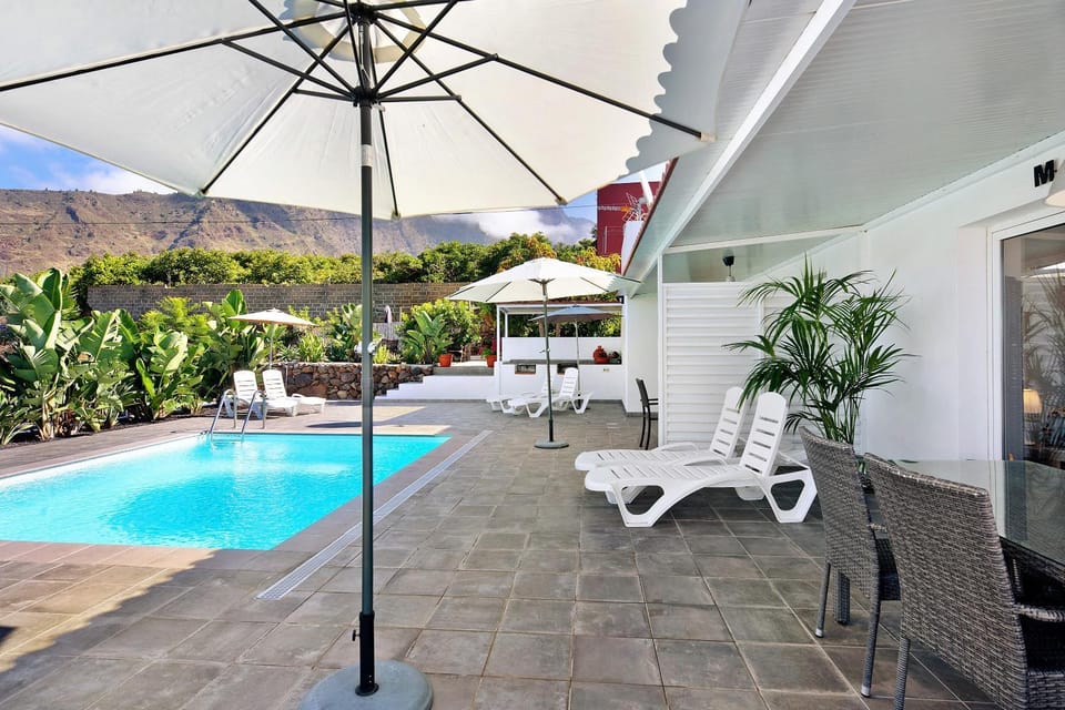 Property building, Living room, Swimming pool