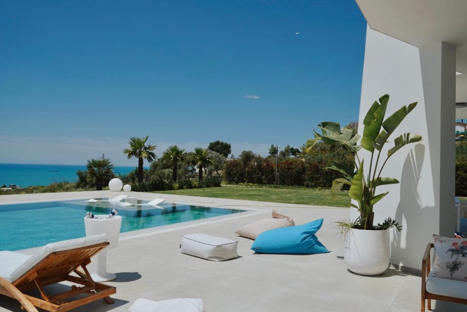 Patio, Natural landscape, Pool view, Sea view, Swimming pool, sunbed