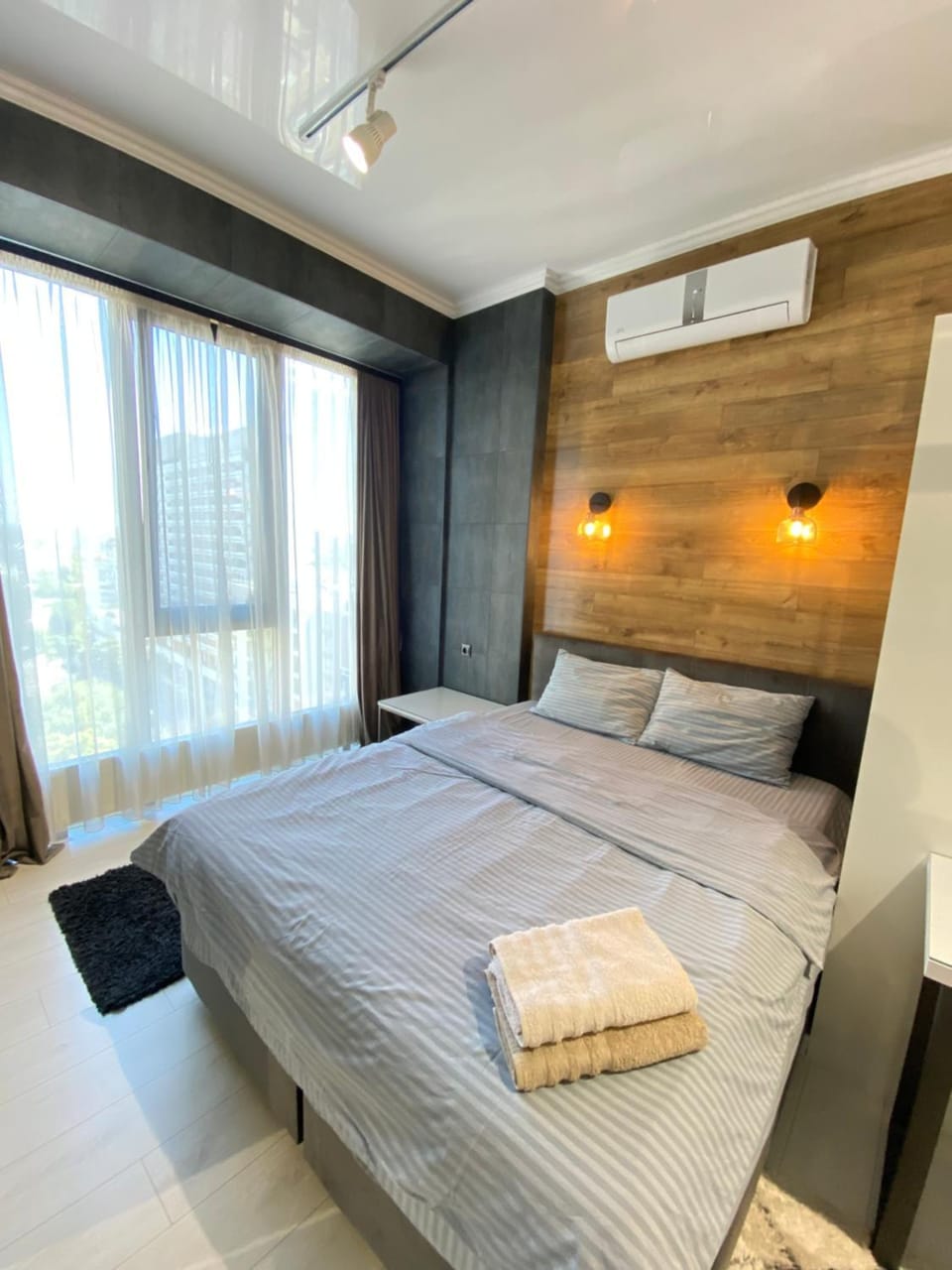 Bed, Photo of the whole room, Bedroom, towels, air conditioner