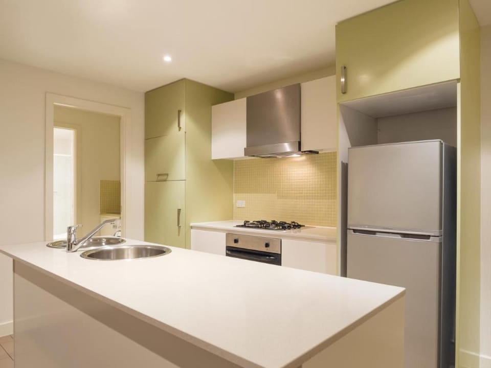 Kitchen or kitchenette, dishwasher, oven, stove