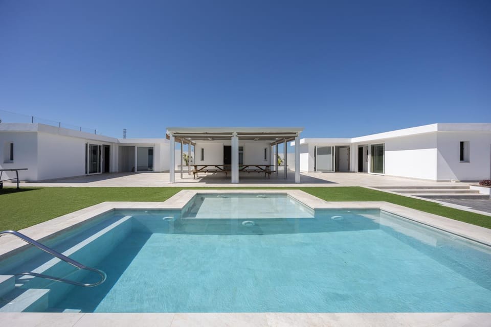 Property building, Living room, Swimming pool