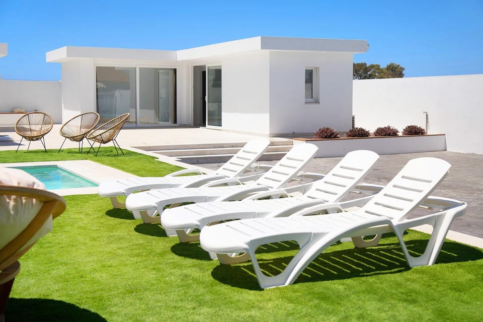 Property building, Living room, Swimming pool