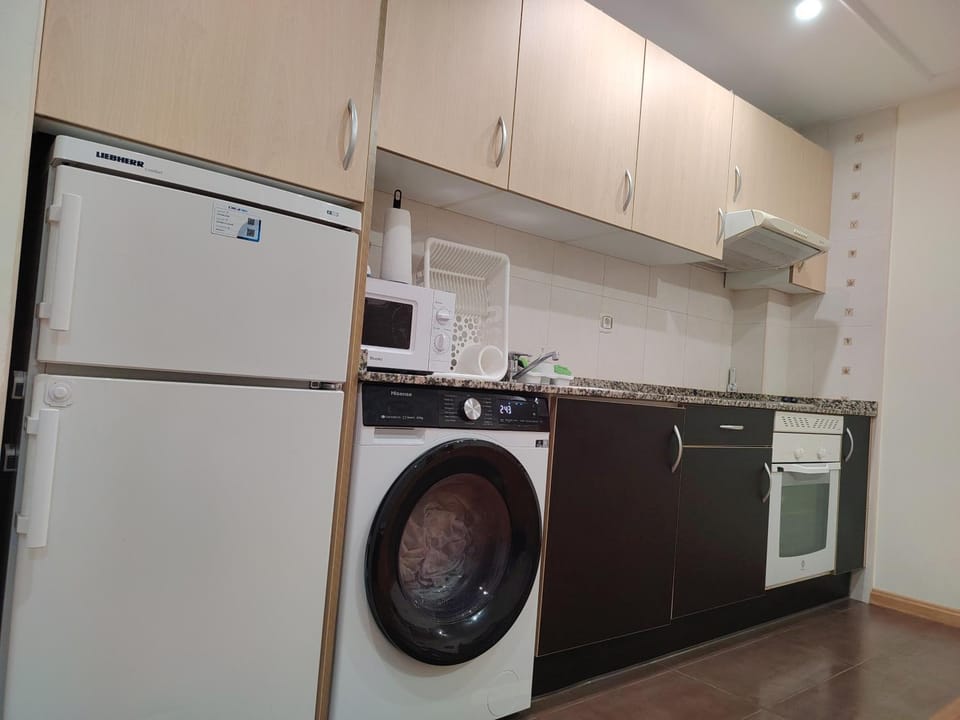 Kitchen or kitchenette, washing machine, dryer