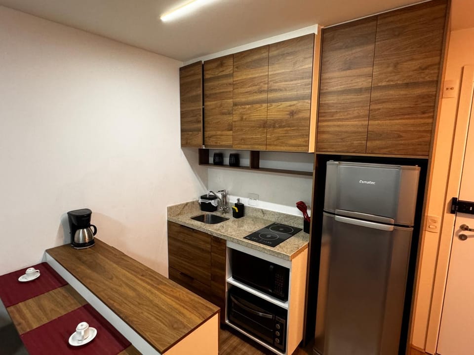Kitchen or kitchenette, oven, stove