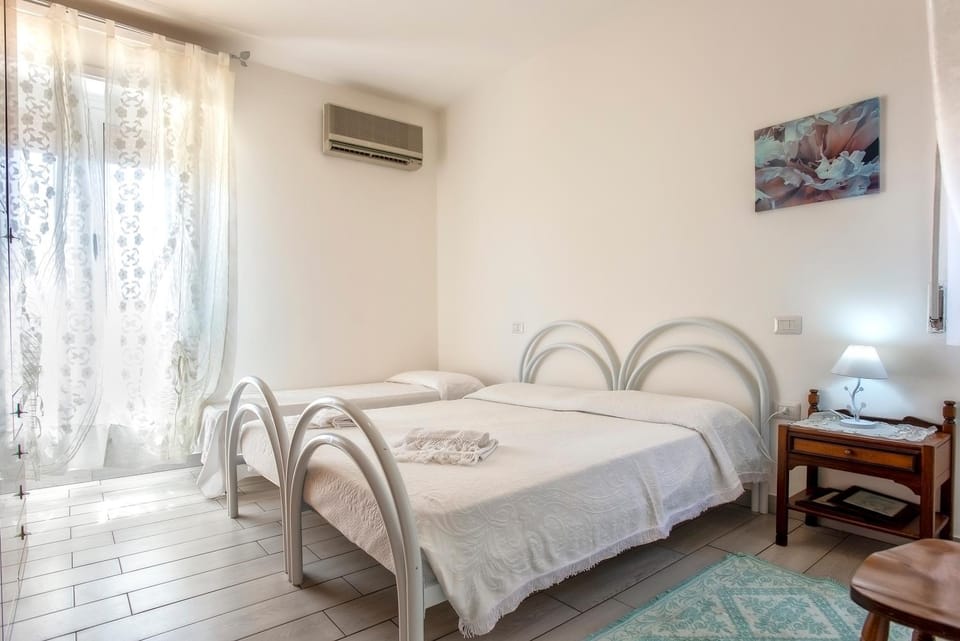 Bed, Photo of the whole room, Bedroom, towels, air conditioner