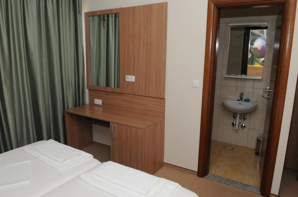 Toilet, Bathroom, Seating area, Bedroom
