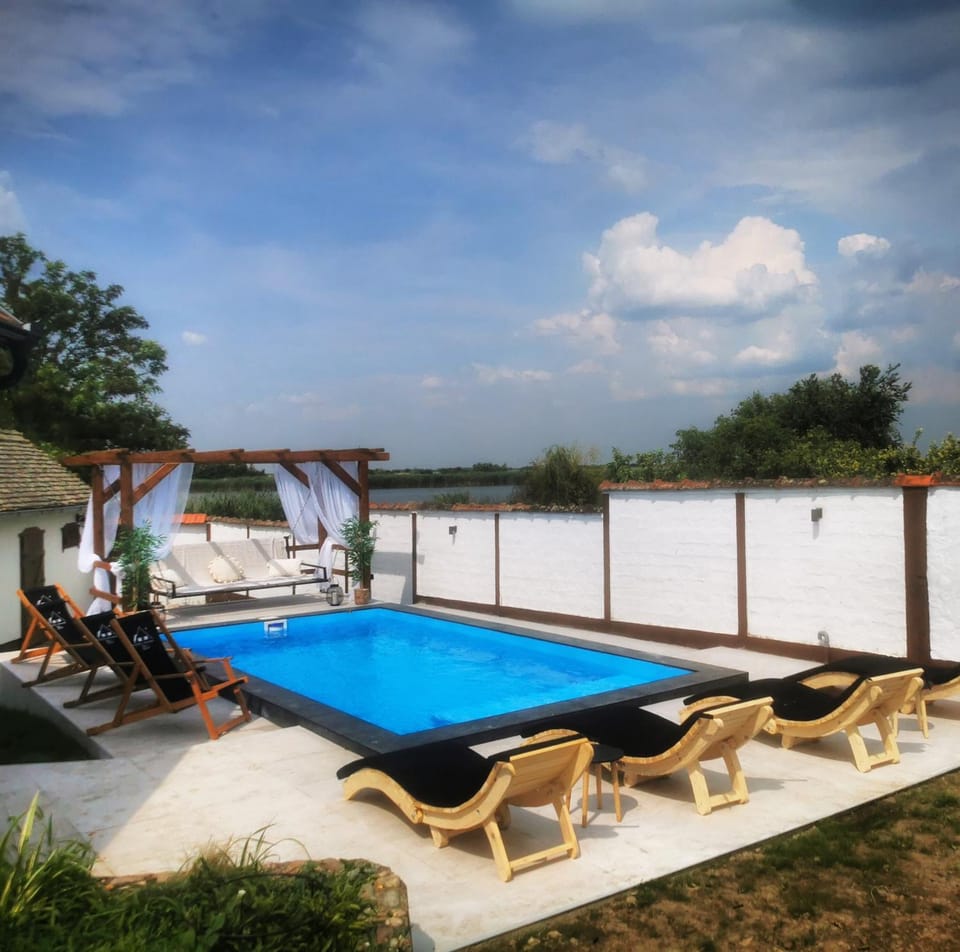 Swimming pool, sunbed