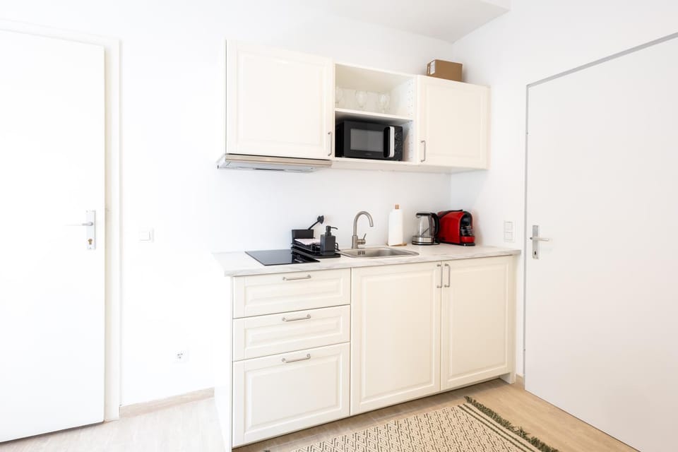 Coffee/tea facilities, Kitchen or kitchenette, minibar, stove, toaster