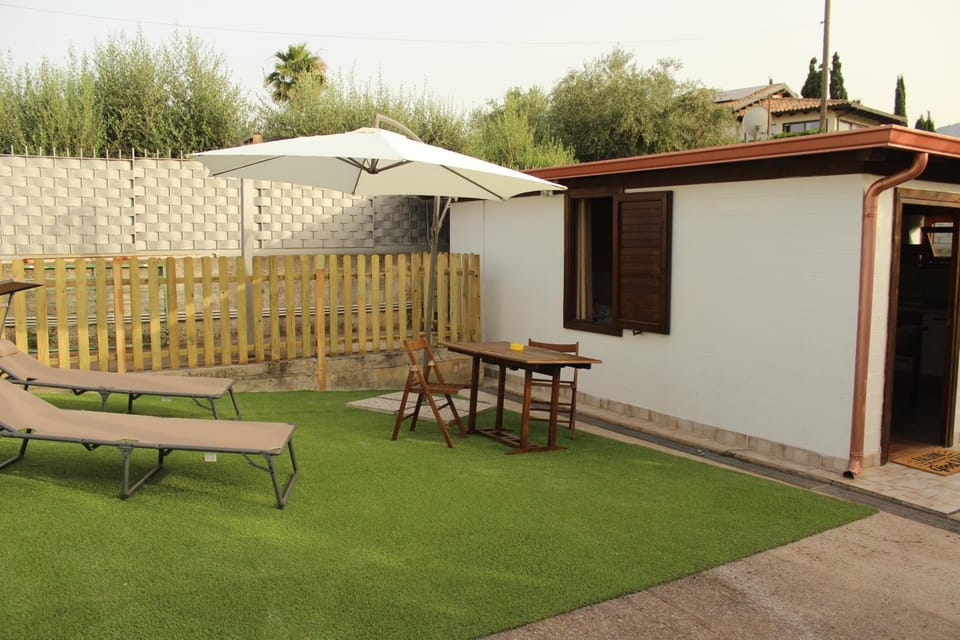 Property building, Patio, Spring, Garden, Garden view, sunbed