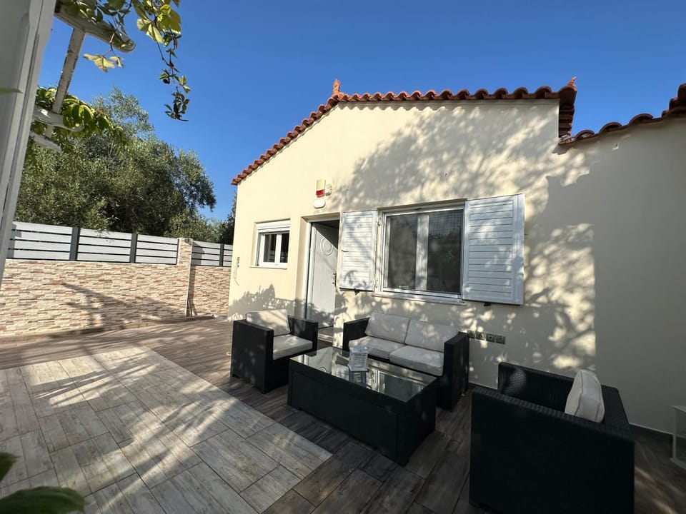 Property building, Patio, Day, Living room, Seating area