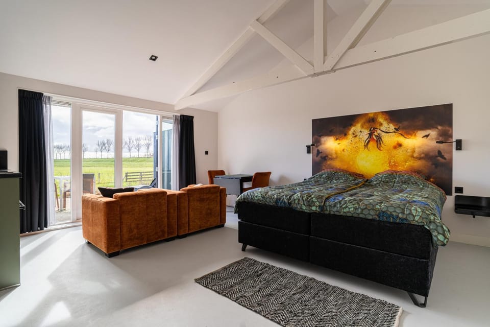 Bed, Living room, Seating area, Bedroom