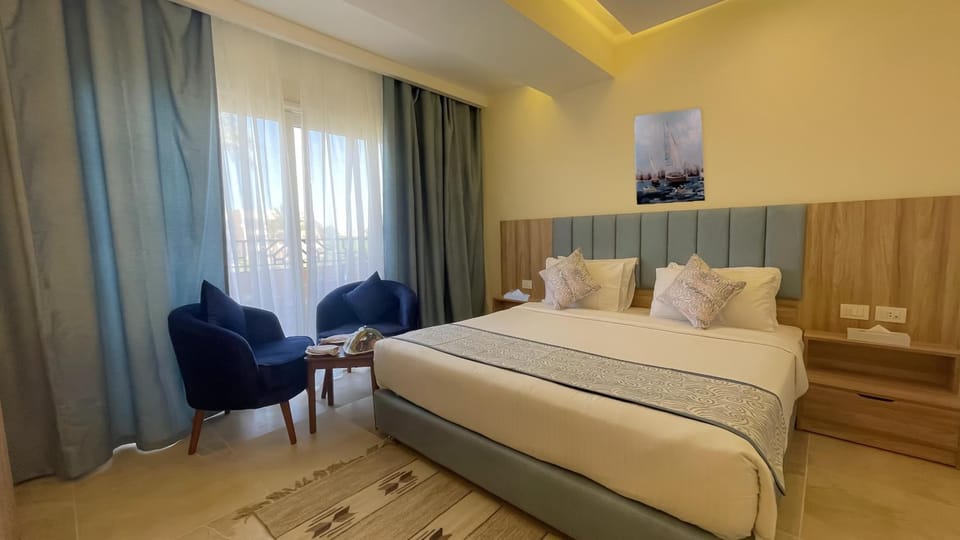 Bed, Seating area, Bedroom