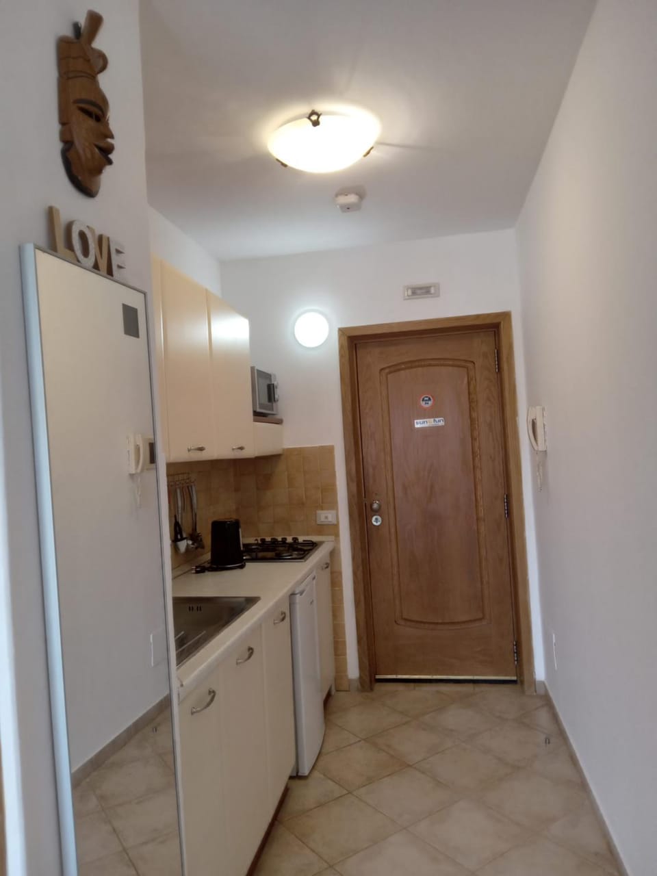Kitchen or kitchenette, stove
