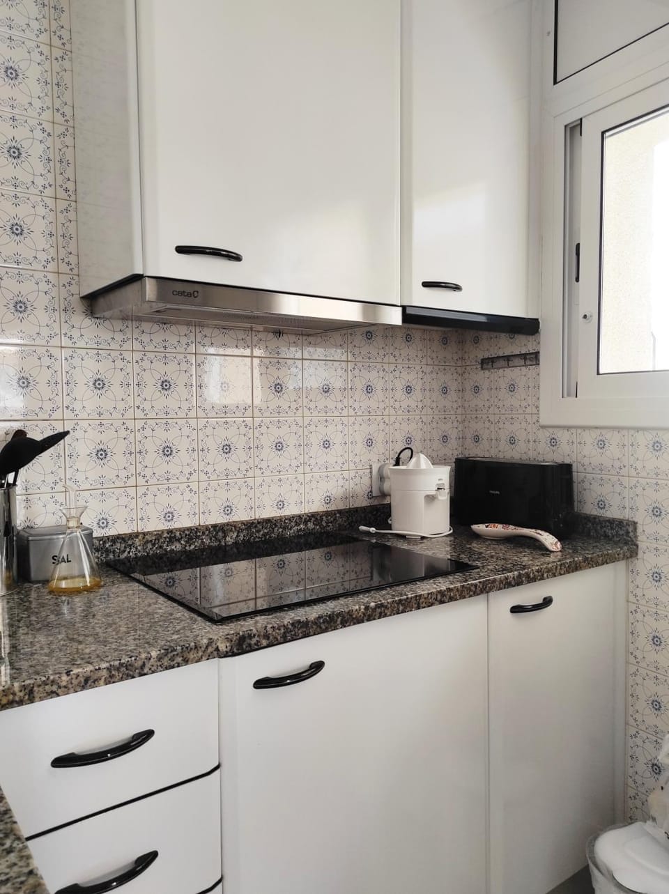 Kitchen or kitchenette, stove