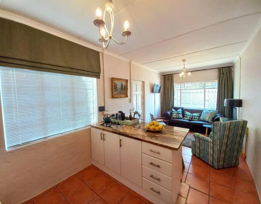 Kitchen or kitchenette, Living room, Seating area, Dining area, stove