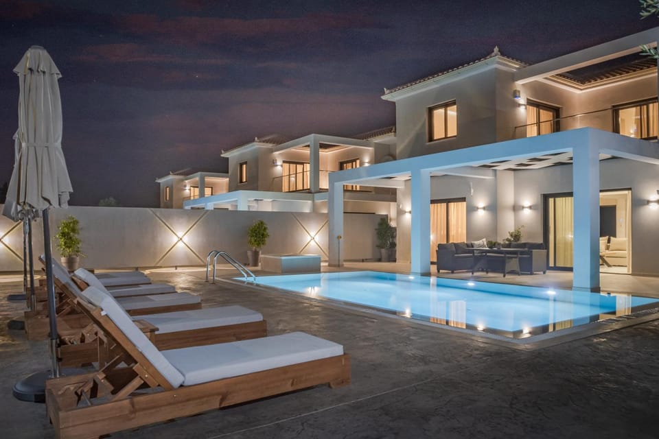 Property building, Night, Natural landscape, Pool view, Swimming pool, sunbed