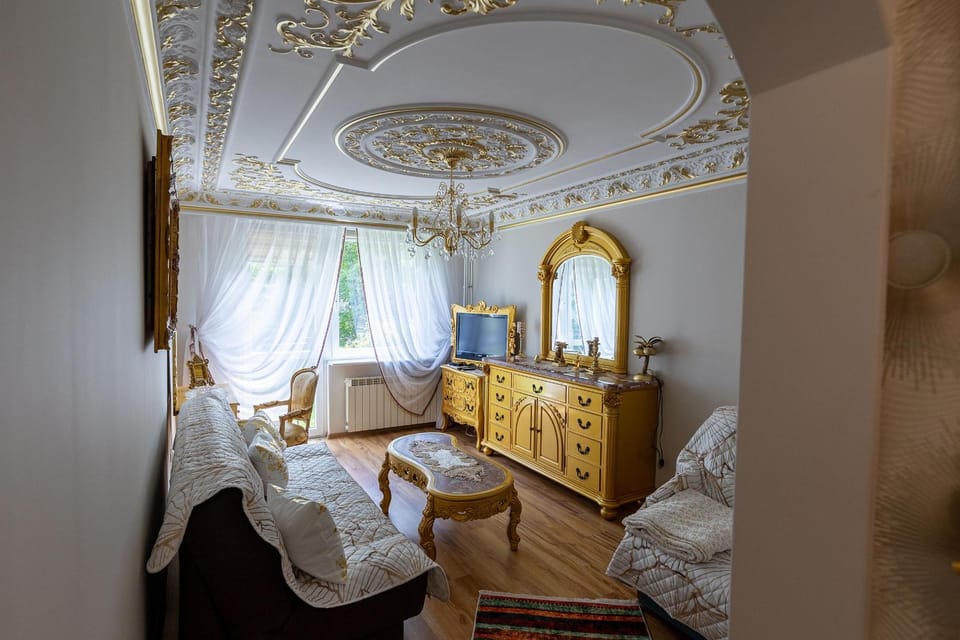 Bed, TV and multimedia, Living room, Seating area