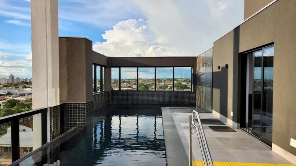 Estúdio com Quarto Privativo, TV e Cama Super King House in Campo Grande