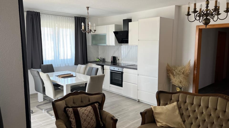Kitchen or kitchenette, Living room, Seating area, Dining area, dishwasher, oven, stove