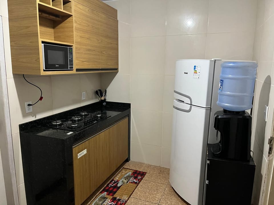 Kitchen or kitchenette, microwave, minibar, oven, stove