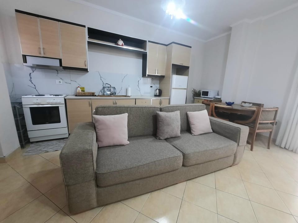 Kitchen or kitchenette, Living room, Seating area, Dining area, oven, stove, toaster