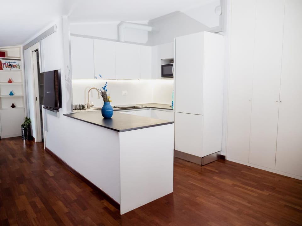 Kitchen or kitchenette, oven, stove
