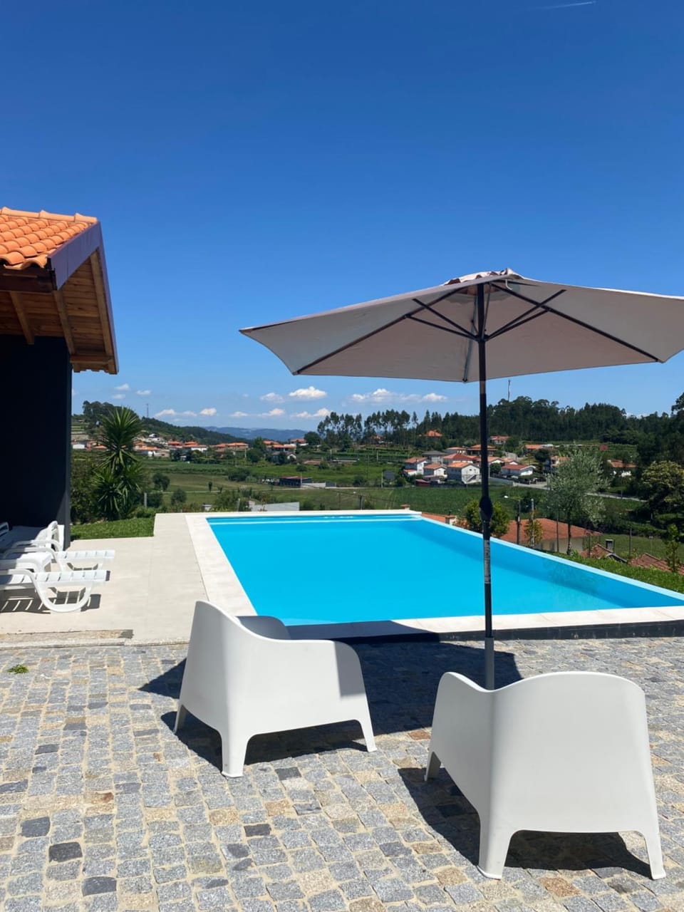 Patio, Natural landscape, Pool view, Swimming pool, sunbed