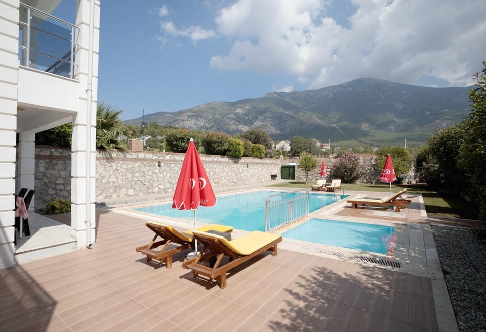 Property building, Patio, Day, Natural landscape, Balcony/Terrace, Mountain view, Pool view, Swimming pool, sunbed
