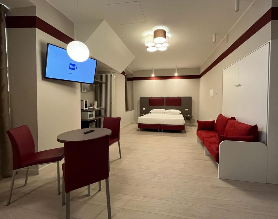 Bed, TV and multimedia, Living room, Photo of the whole room, Seating area, Bedroom, hair dresser