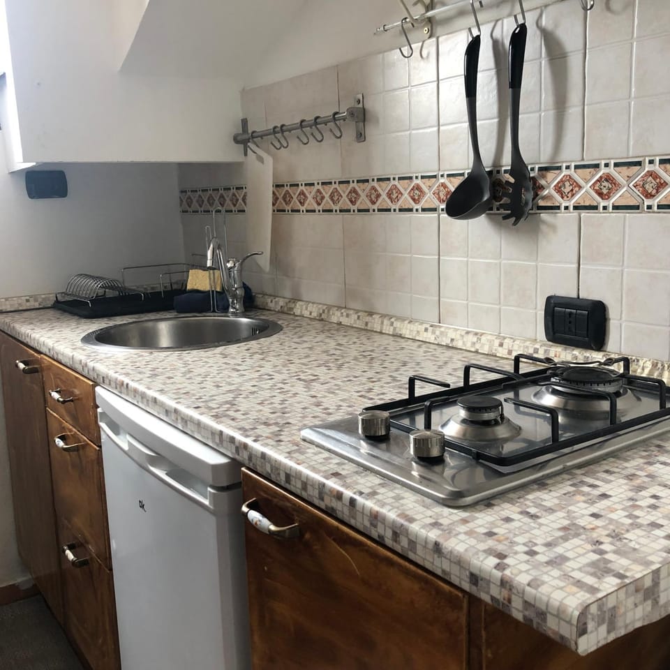 Kitchen or kitchenette, stove