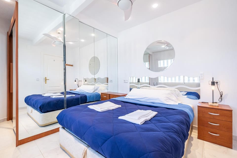 Bed, Bedroom, fireplace, towels, wardrobe