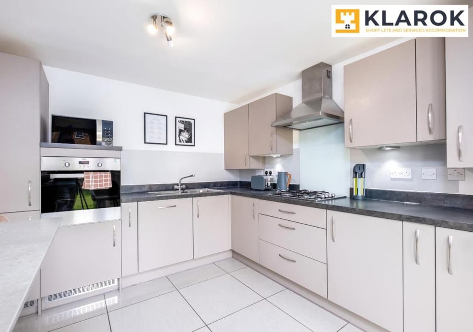 Kitchen or kitchenette, microwave, oven, stove, toaster