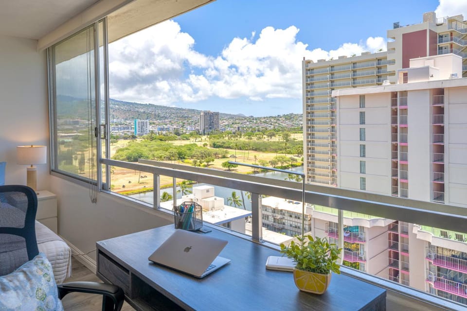 Day, View (from property/room), Living room, Seating area, City view, Mountain view