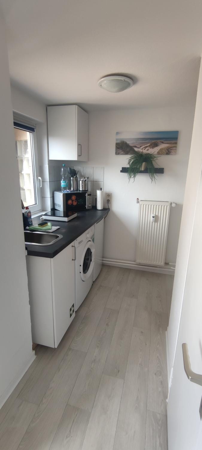 Kitchen or kitchenette, stove